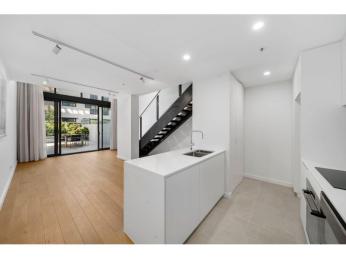 Sunlit Loft Living with Expansive Courtyard in ‘Seventy One’